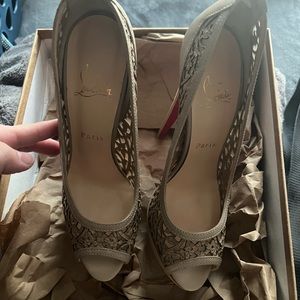 Christian Louboutin heels. Never worn. Size 39